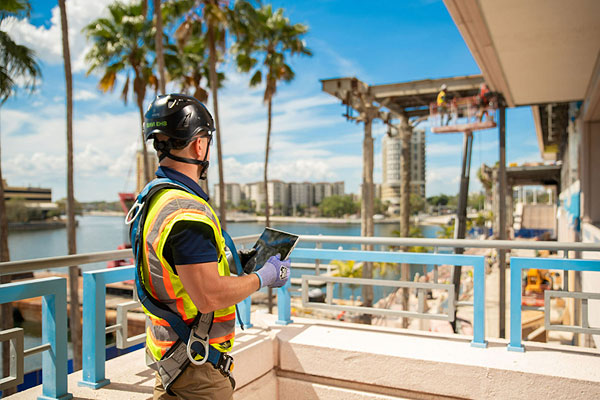 Two men investigating an incident scene.